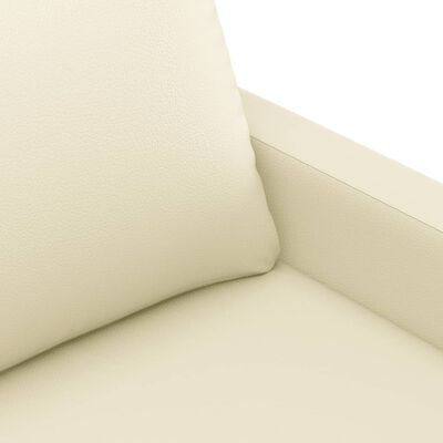 Close-up view of beige sofa upholstery texture with fine grain leather-like surface.