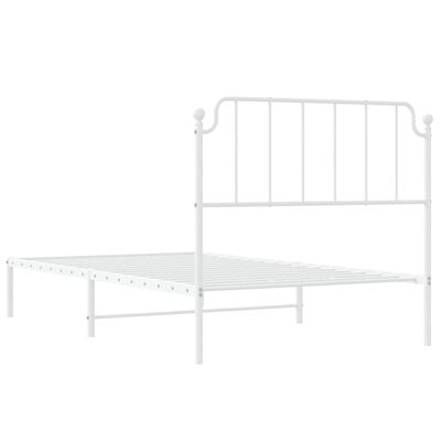 White metal bed frame with headboard, footboard not visible, perspective showing length