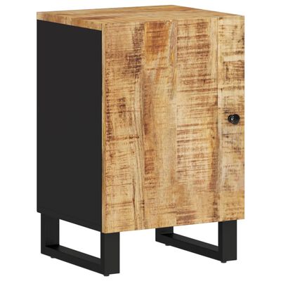 Close-up of a rustic wood cabinet door with black frame and metal base