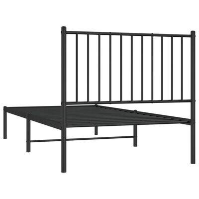 Perspective view of black metal bed frame with headboard and slatted base