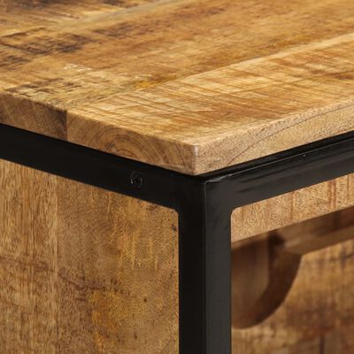 Close-up of top edge with metal frame and wood top.