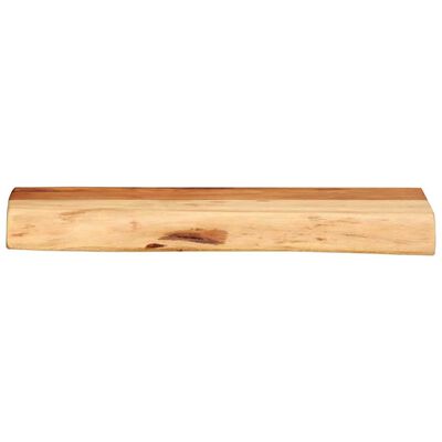 A wooden block or end-cap shaped cutting board piece with rounded top edge.