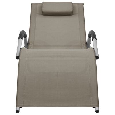 Front view of a beige outdoor chaise lounge with integrated headrest and matching side supports.