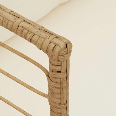 Close-up of the woven rattan armrest with creamy cushion visible.