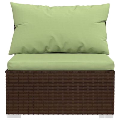 Close-up of a brown wicker modular seat with light green cushions.