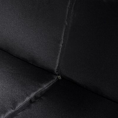 Black fabric cushion seam and corner stitch on a sectional sofa