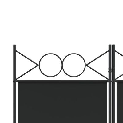 Close-up of the top decorative metalwork on a black metal room divider, showing circles and triangles.