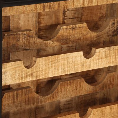 Close-up of wine slots and cutouts in wooden rack.
