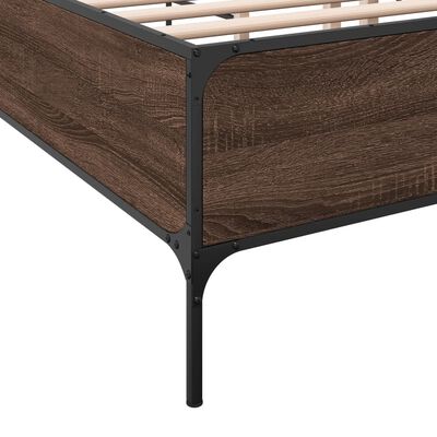 Close-up of the bed frame corner showing wood paneling and metal joints.