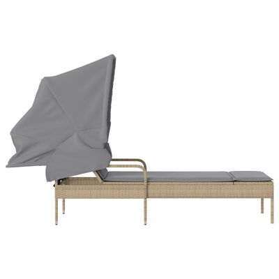 Side view of lounge chair with canopy partially folded and a cushioned surface.