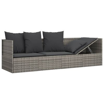 Outdoor wicker sofa with cushioned seats and a slanted back cushion on the right.