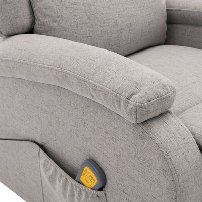 Close-up of the armrest and side pocket on the gray recliner