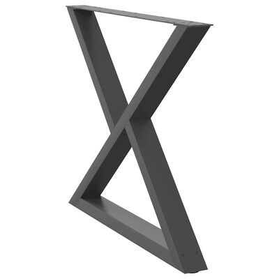 Close-up of a single X-shaped metal table leg in dark gray