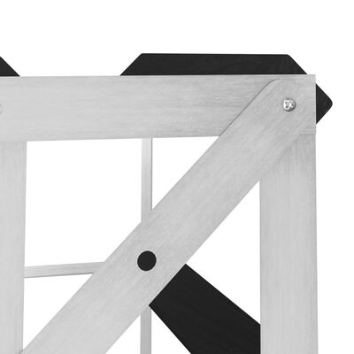 Corner of a wooden frame of a wine rack with a diagonal support beam and screws visible.
