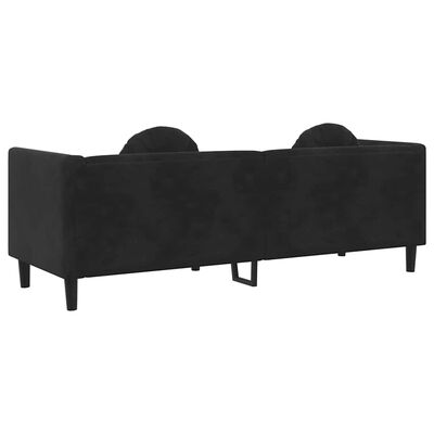 Back view of the black sofa with a gap showing a metal support under the upholstery.
