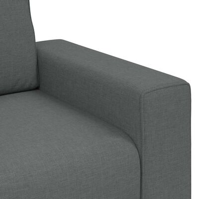 Close-up of the sofa arm and fabric texture in grey.