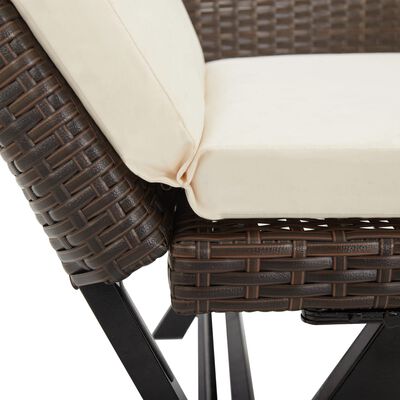 Close-up of beige cushion and dark brown wicker armrest