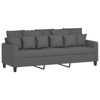 Close-up of a dark gray three-seat sofa with several back cushions and slim legs.