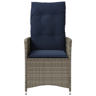 Single navy cushioned wicker chair facing forward