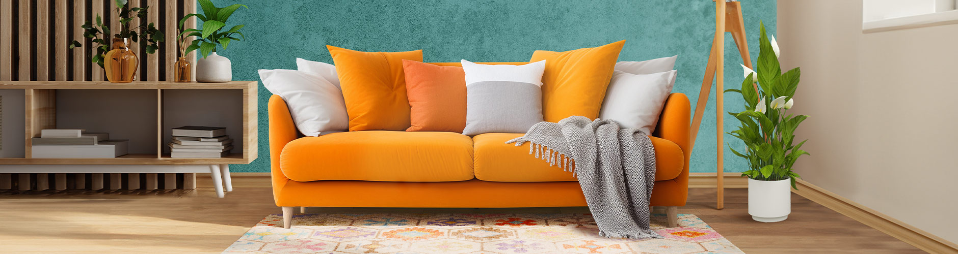 Minimal wooden Christmas tree with lights and ornaments beside wrapped gifts. Click to see the products in the collection.