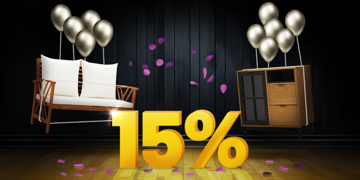 Rattan recliner chair with dark cushions and white filing cabinet lifted by silver balloons and surrounded by purple confetti, with a large yellow 20% sign on a dark background. Click to shop the collection.