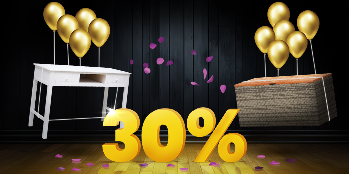 White desk and rattan storage box with a wooden lid lifted by gold balloons and surrounded by purple confetti, with a large yellow 30% sign on a dark background. Click to shop the collection.